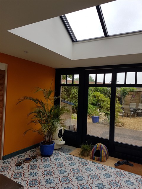 Uitbreiding woonhuis met een serre/tuinkamer